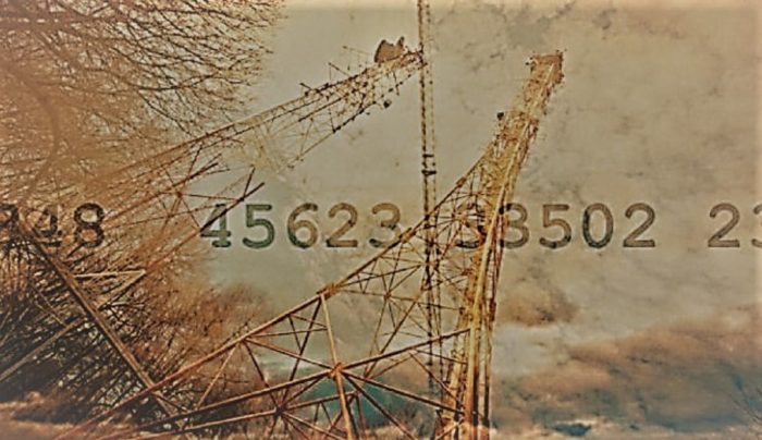 A picture of a radio tower with numbers written across the screen