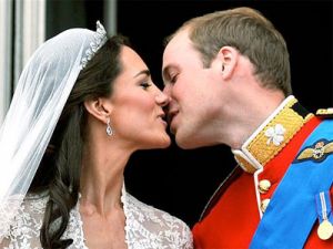 Kate and William Kiss Kate and William kissing on the balcony of Buckingham Palace.