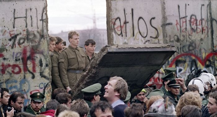 Berlin wall falling.