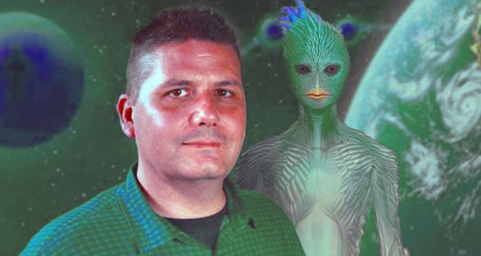 Whistleblower Corey Goode with a drawing of an alien behind him
