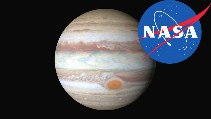 NASA logo in front of an image of Jupiter.