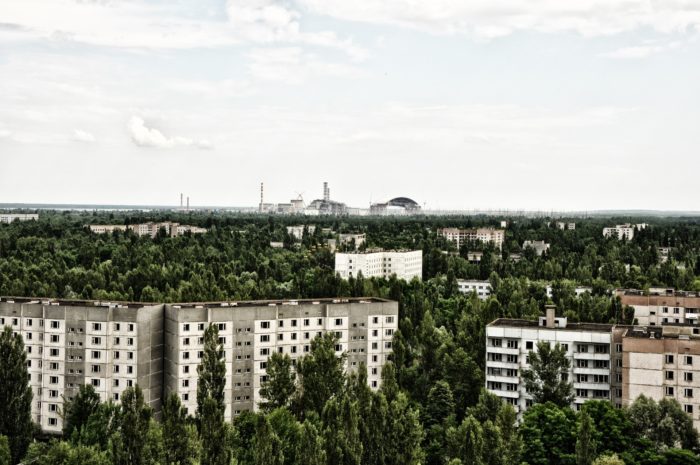 Pripyat with Chernobyl in the background