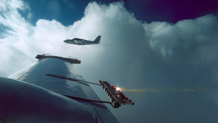 Depiction of planes with silver iodide strapped to their wing