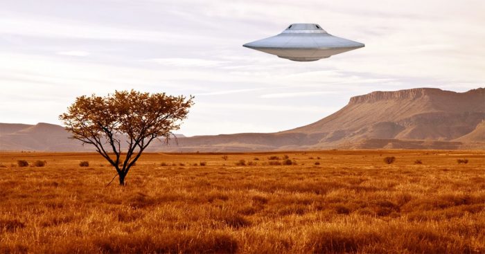 Artist's impression of a UFO over the South African landscape.