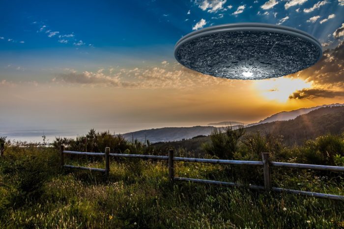 A superimposed UFO over a field