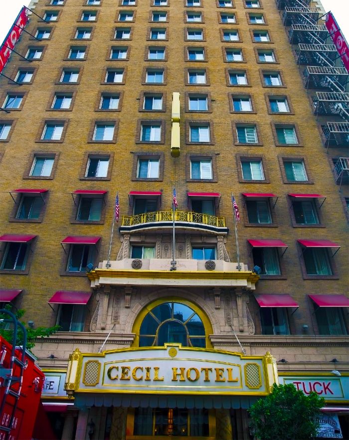 A picture of the Cecil Hotel from outside, looking up