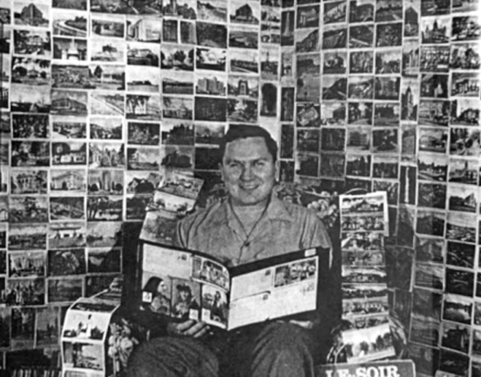 Albert Bender sat reading a book