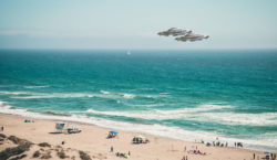 An artist's drawing of two UFOs over Manresa Beach, California.