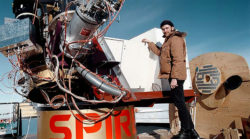 Rodney Marks standing by a telescope in Antarctica before his death.