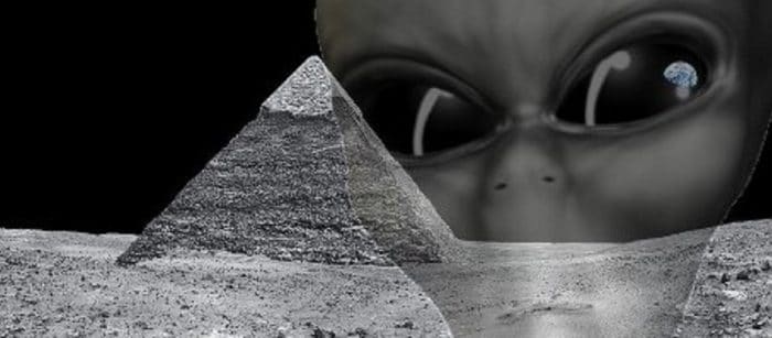 A depiction of a pyramid on the Moon with an alien face superimposed over the top 