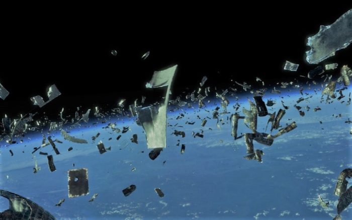 A depiction of vast amounts of space debris above the Earth