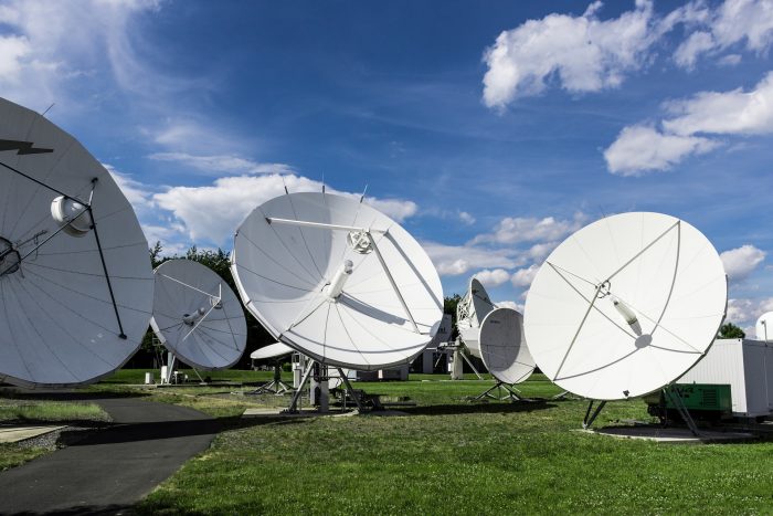 Radio telescopes monitoring signals from outer space