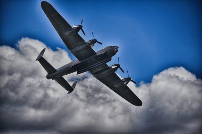 A Lancaster Bomber against a cloudy sky