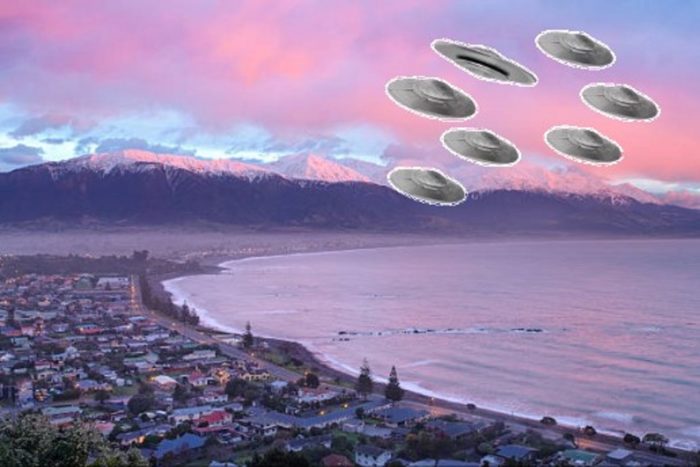 A depiction of a fleet of UFOs over the Kaikoura Mountains