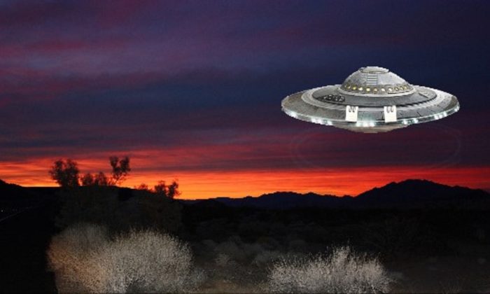 A depiction of a UFO over the desert at night