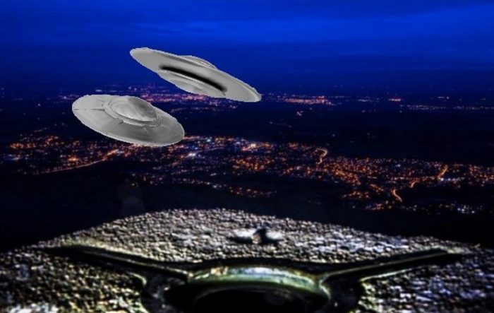 A depiction of UFOs over a hill