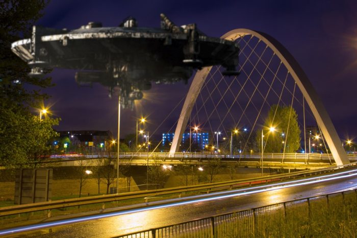A depiction of a UFO over Manchester
