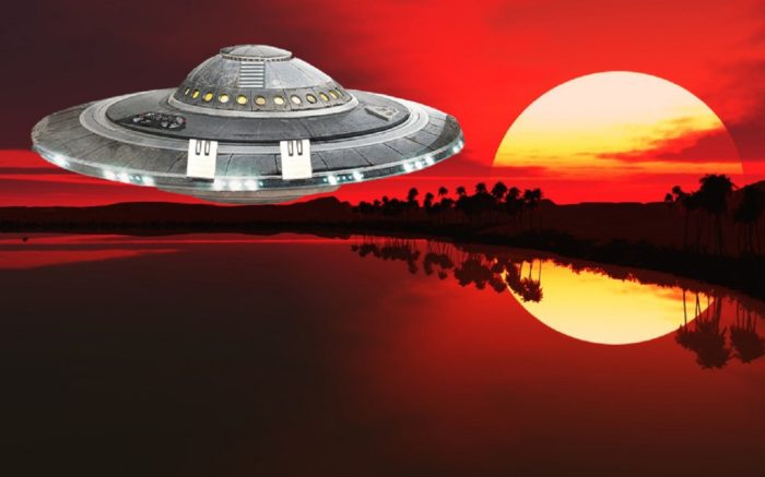 A depiction of a UFO in a sunset sky