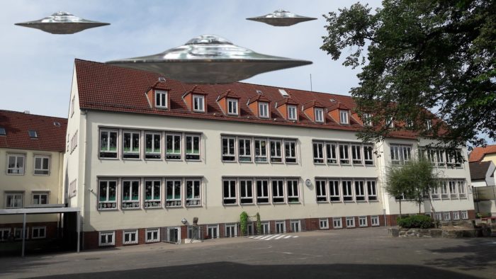 A depiction of a UFO over a school 
