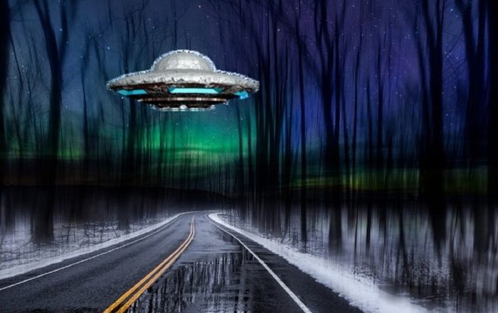 A depiction of a UFO over a cold icy road