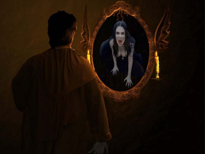 A picture of a man looking into a mirror with a vampire woman looking back