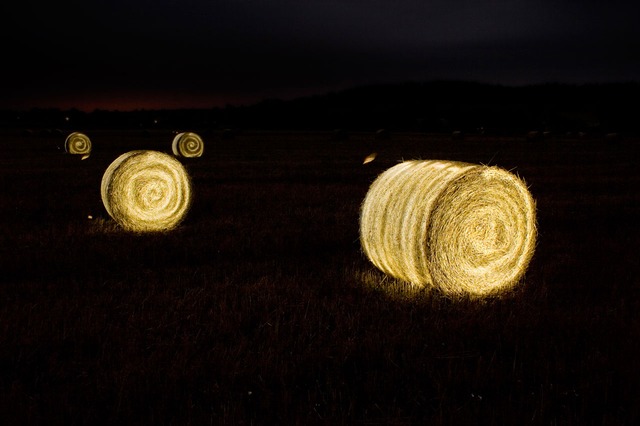 A picture of glowing haystacks 