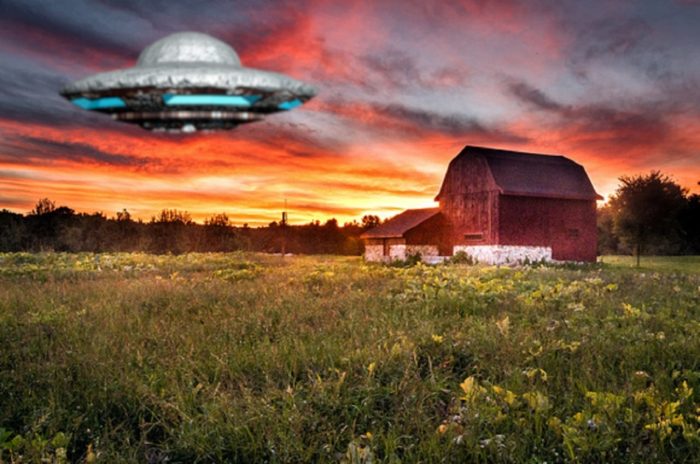 A depiction of a UFO over an American farm