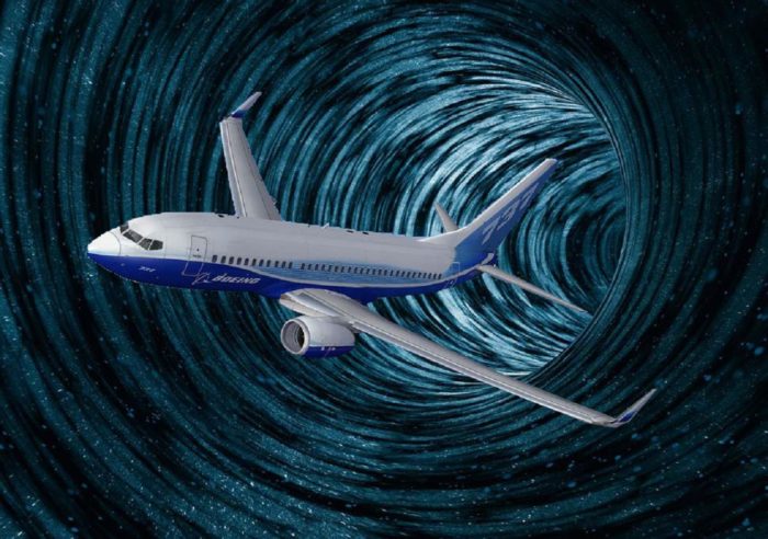 A plane superimposed coming out of a wormhole