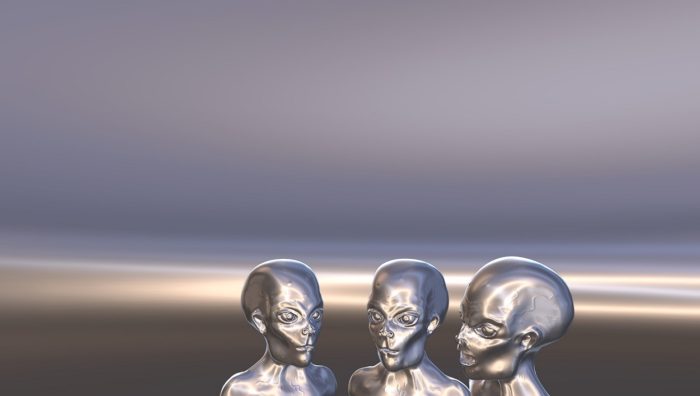 A depiction of silver aliens