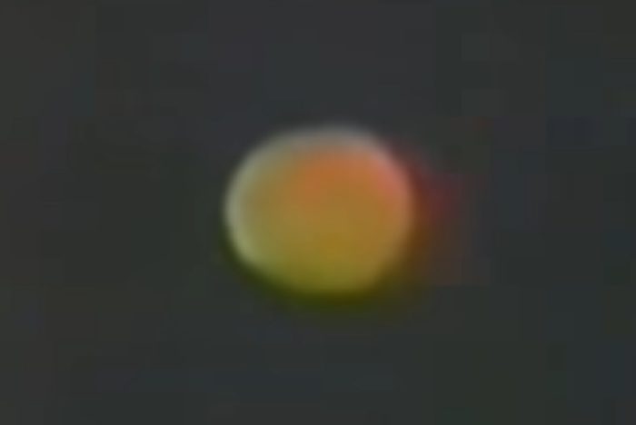 A picture of an apparent UFO overhead