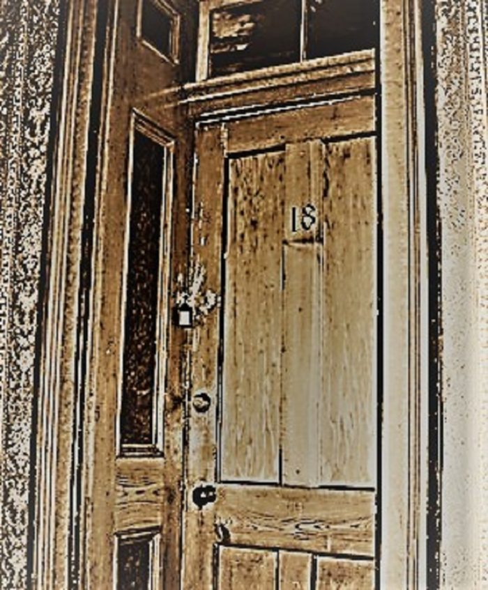 The doorway of Room 18