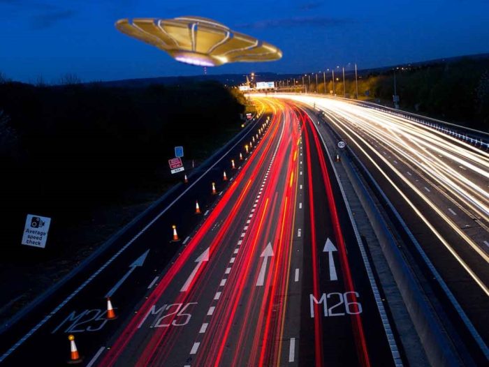 A superimposed UFO over a motorway