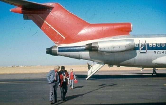 A picture of the open airstair of Boeing 727 on the runway