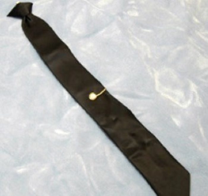 A close-up of the recovered clip-on tie