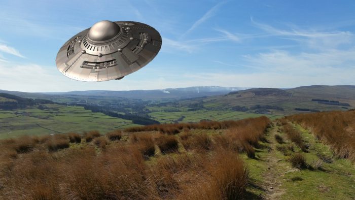 Superimposed UFO over the English countryside