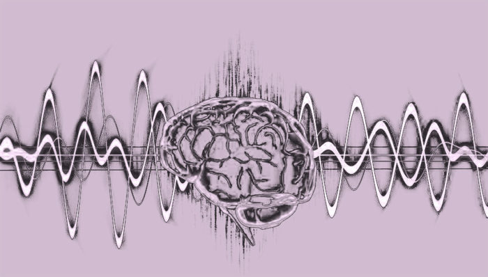 A picture of a human brain with microwaves passing through it