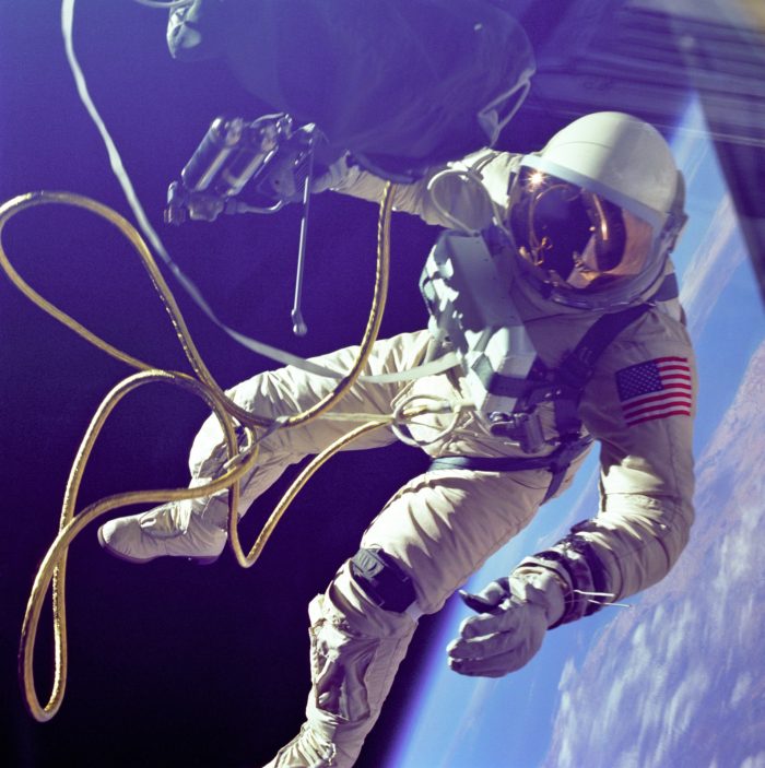 An astronaut in the middle of a spacewalk