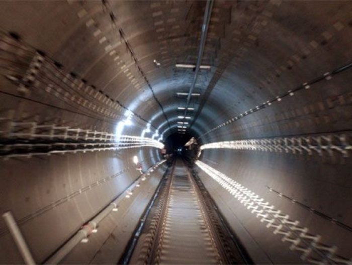A picture of an enclosed single underground rail line