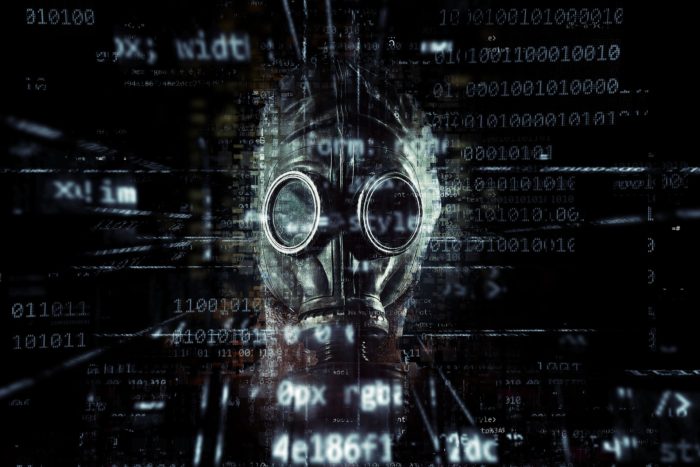 A gas mask superimposed onto a screen of digital information 