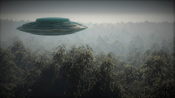 A depiction of a UFO hovering over a forest 