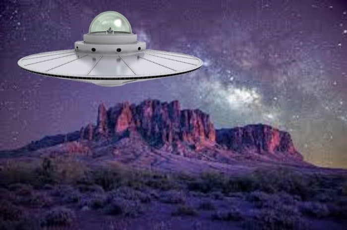 A depiction of a UFO over the Arizona desert at night