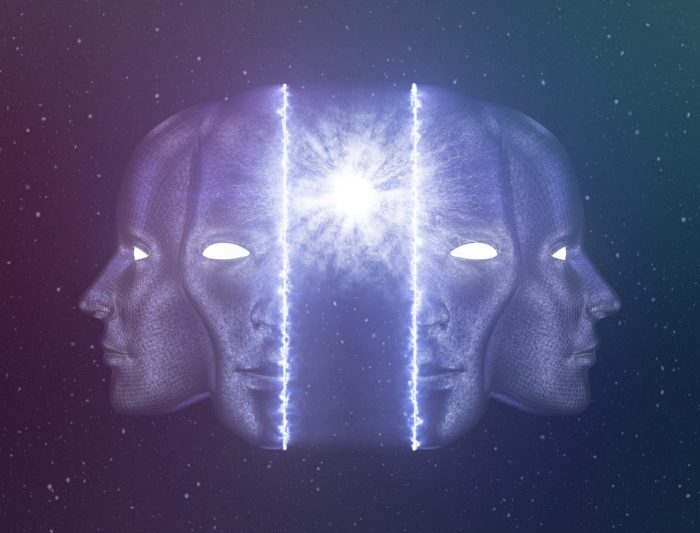 A human head in space splitting to reveal an inner light