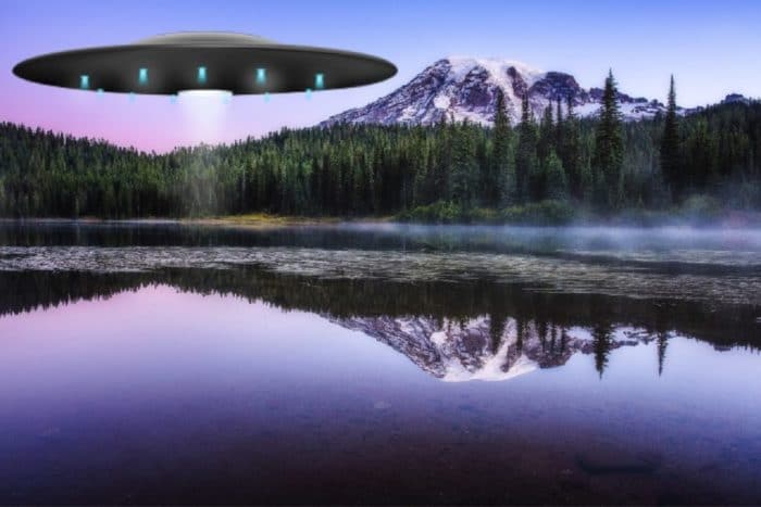 A depiction of a UFO hovering over water