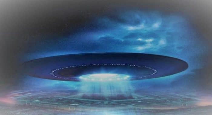 A depiction of a UFO over a field