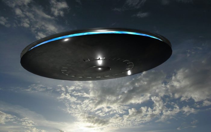 A depiction of a UFO in a cloudy sky