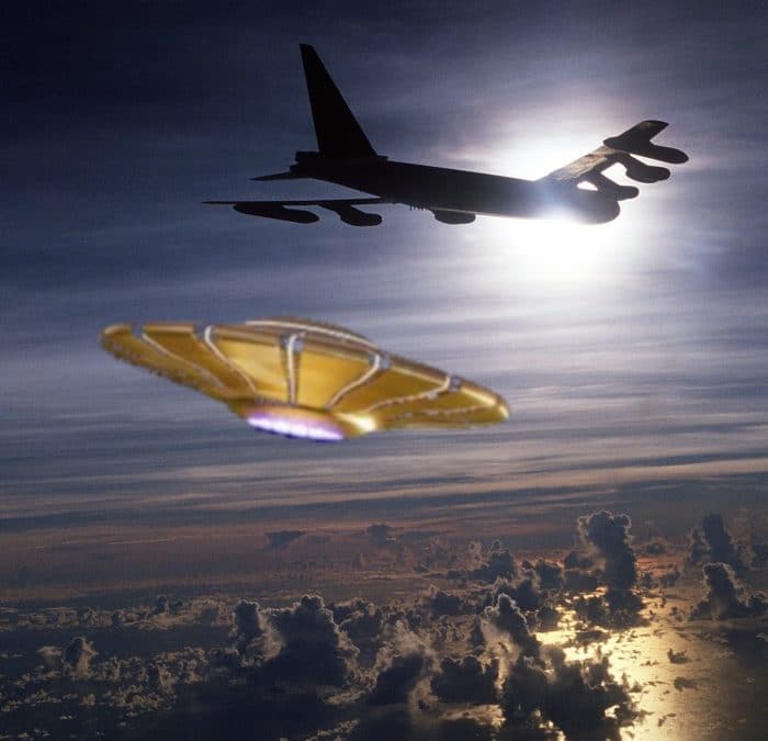 A depiction of a UFO flying next to a military plane