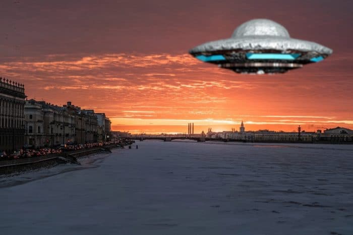 A depiction of a UFO over a Soviet city at night