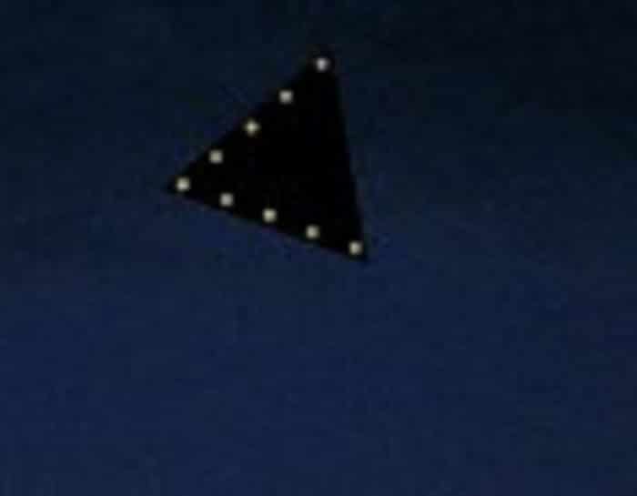A depiction of a black triangle UFO