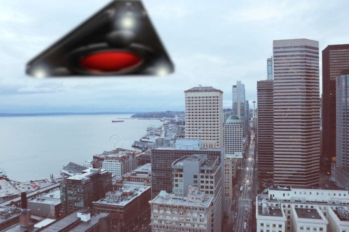 Depiction of Black triangle UFOs over an American city