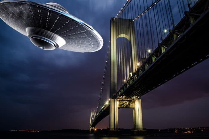 A depiction of a UFO over the Brooklyn Bridge